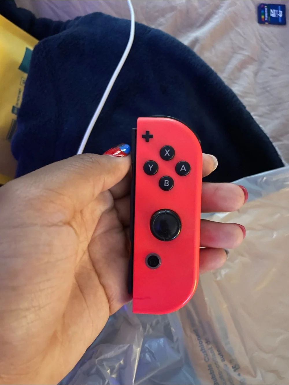 Nintendo Switch Console Bundle with Red Joy-Con and Mario + Rabbids Game
